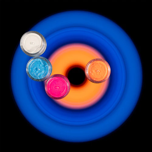 Four containers placed over a blue and orange Circular Light exposure