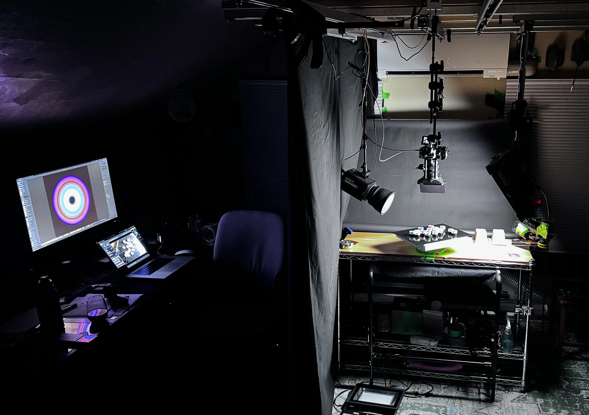 Michael Hill's darkened studio with a Nikon camera above the turntable and a Circular Light photograph on the editing monitor